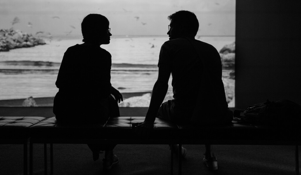 Two people engaged in a dialogue