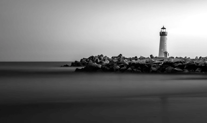 Image of a lighthouse accompanying a blog post about leadership and coaching.