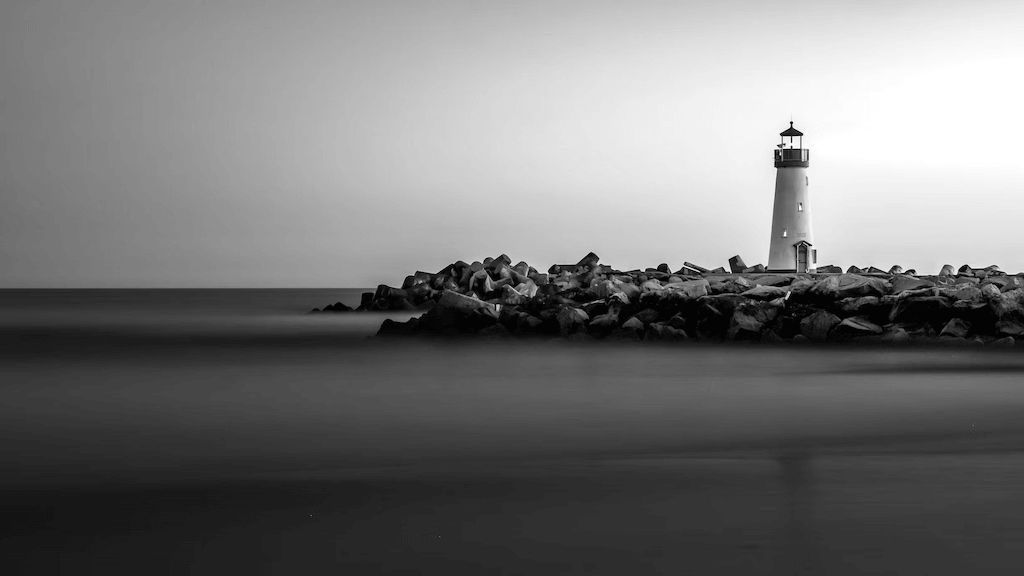 Image of a lighthouse accompanying a blog post about leadership and coaching.