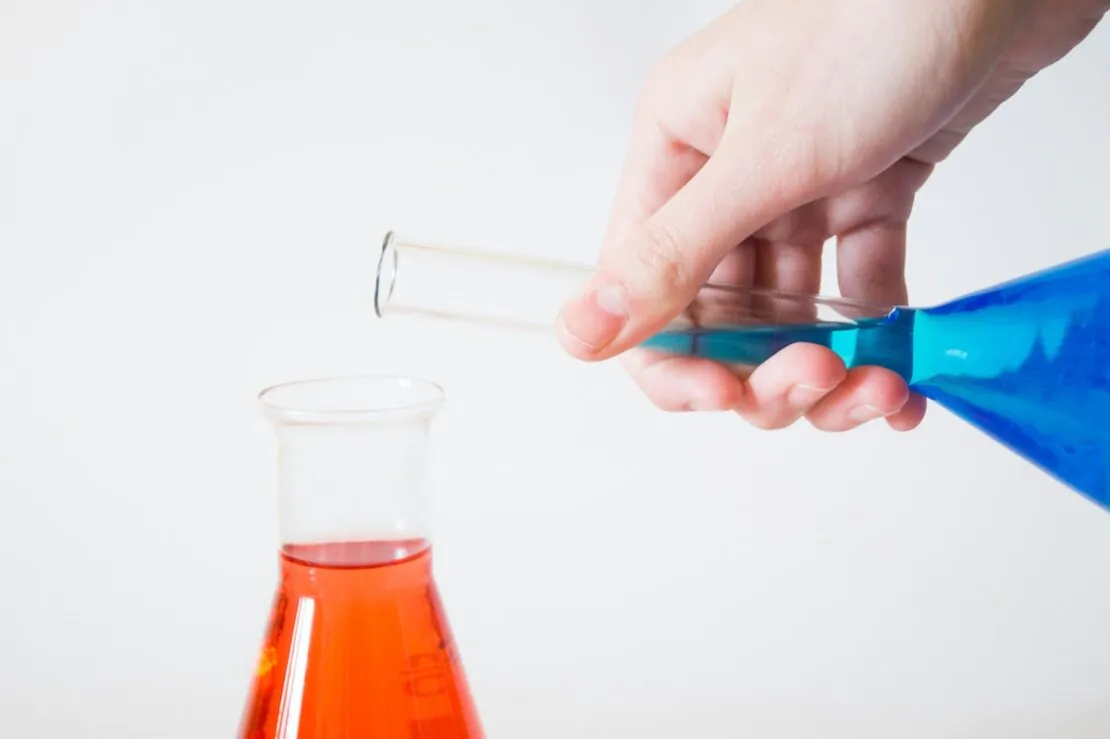 Coaching chemistry (image of two chemicals being mixed)